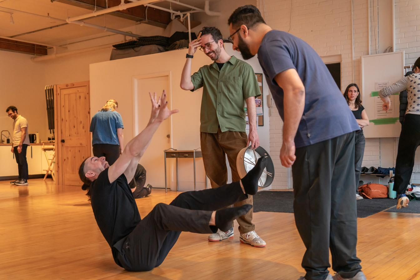 Chase Jeffels coaching a student during a clown drop-in